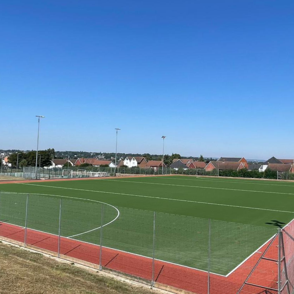 Sunny day at Maidstone Hockey Club with Blue Skies and a Green Hockey Pitch