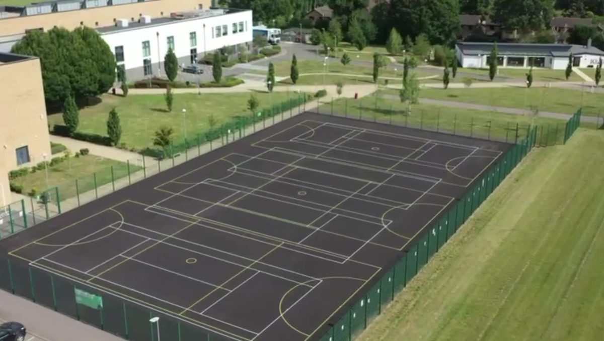Porous Macadam MUGA catered for both tennis and netball court, installed by AS Sports at Kings Langley School.